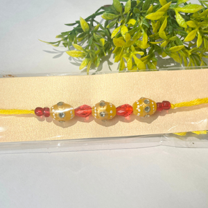 YELLOW AND RED RAKHI